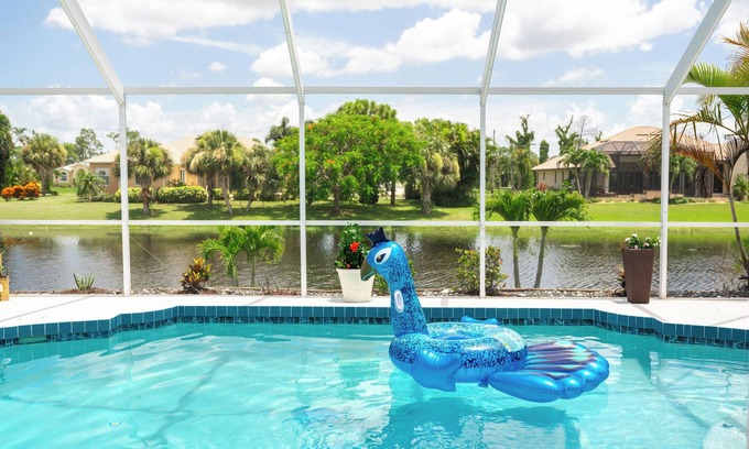 Rotonda Sands House | Heated Pool, WIFI, Grill, Near Boca Grande and Englewood Beach,nYard w/Canal