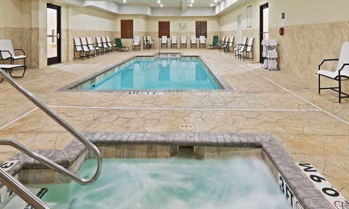 Central Oklahoma City Condo | Heated Saltwater Pool. Free Breakfast Buffet Daily.