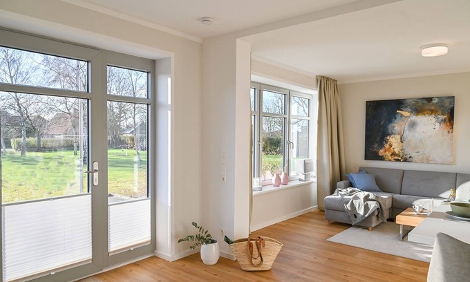 Daenschendorf Apartment | Helle Deel - Light-flooded holiday apartment with sauna and terrace