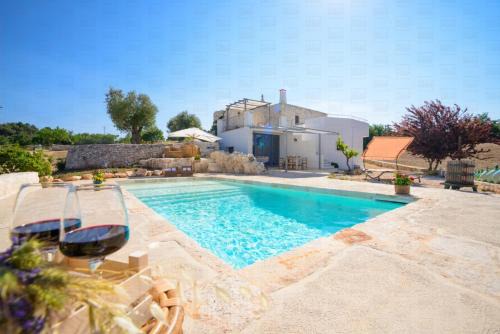 Martina Franca Apartment | HelloAPULIA - Panoramic Trulli Pozzo Fornello with private pool