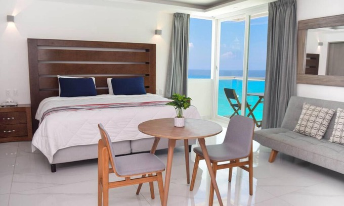 Zona Hotelera Apartment | Hermoso estudio frente al mar, balcon, gym 3504