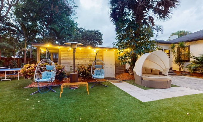 Poinciana Park House | Historic home in great locale with shared sauna, Ping-Pong, mini-golf, & grill