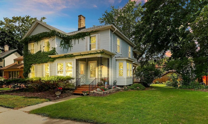 Racine House | Historic house on tree lined red brick street of historic homes.
