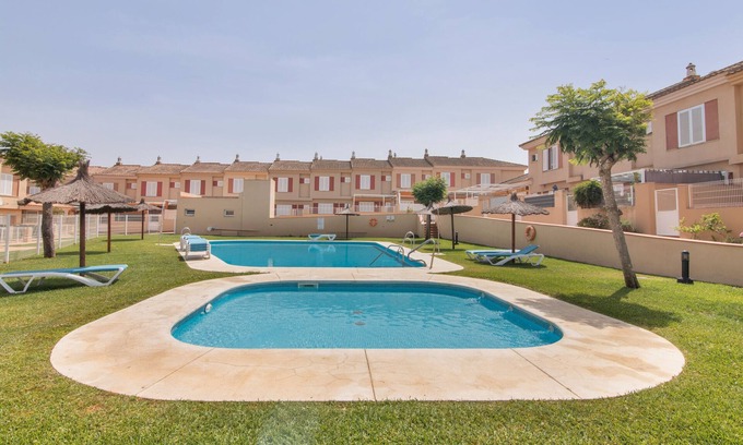 Isla Cristina House | Holiday Home 'Puerta Marina Costa de la Luz' close to the Sea with Shared Pool