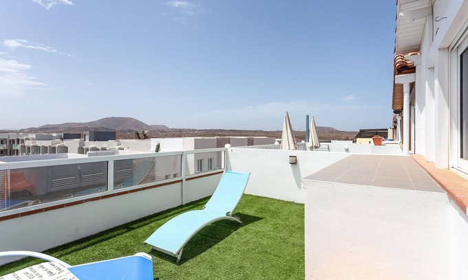 Corralejo Apartment | Holiday Apartment "Atico Casapueblo" Near the Beach with Mountain View