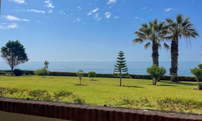 Torrox Costa Apartment | Holiday Apartment 'Casa Del Sol' close to the Beach with Sea View, Shared Garden & Wi-Fi
