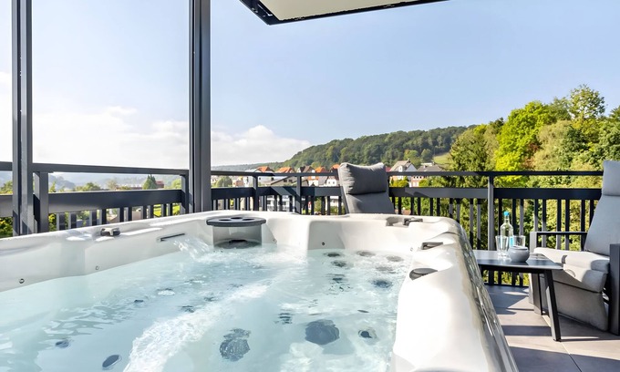 Altenbeken Apartment | Holiday Apartment "Egge Resort 7d" with Balcony, Whirlpool and Sauna with Viaduct View