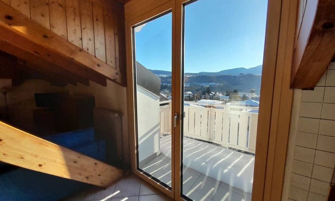 Brez Apartment | Holiday apartment in light and large attic flat with wooden beams