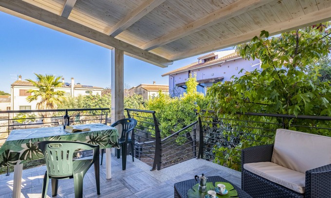 Bari Sardo House | Holiday Apartment LaTorre with Balcony, Terrace and Shared Garden