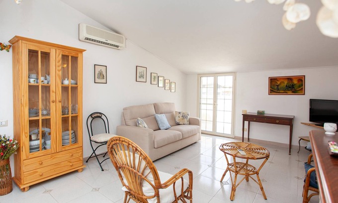 La Caletta House | Holiday home Apartment Mansarda La Caletta with A/C & Terrace
