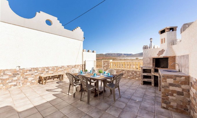 Pujaire House | Holiday Home 'La Tierra' with Private Terrace