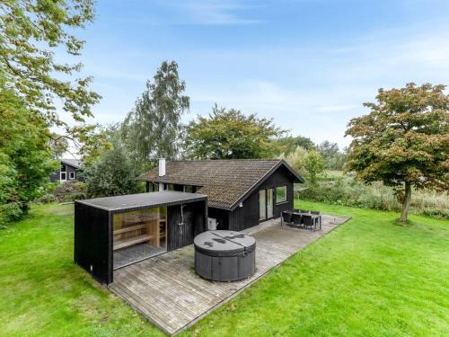 Idestrup House | Holiday Home Litle - 30m from the sea by Interhome
