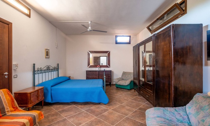 Galatone House | Holiday Home 'Rosso Pepe' with Private Terrace, Private Garden and Air Conditioning