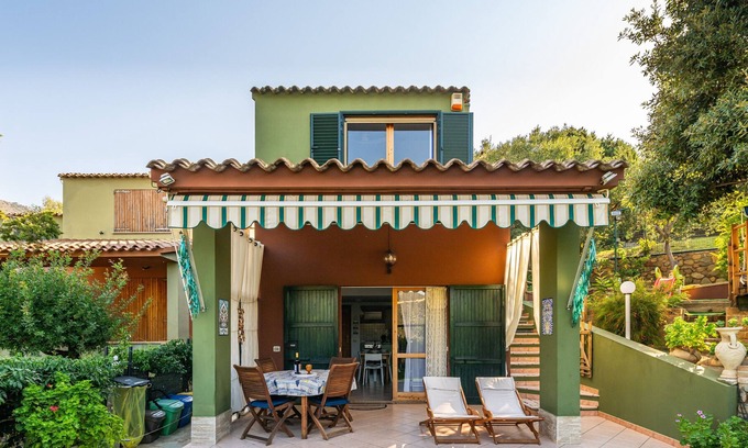 Porto Sa Ruxi House | Holiday Home "Villetta Anna a Porto Sa Ruxi" with Sea View, Shared Pool & Wi-Fi
