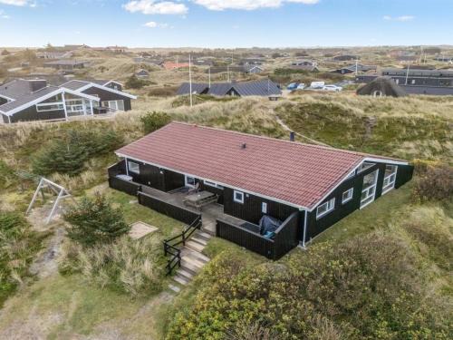 Houvig Strand House | Holiday Home Wighman - from the sea by Interhome