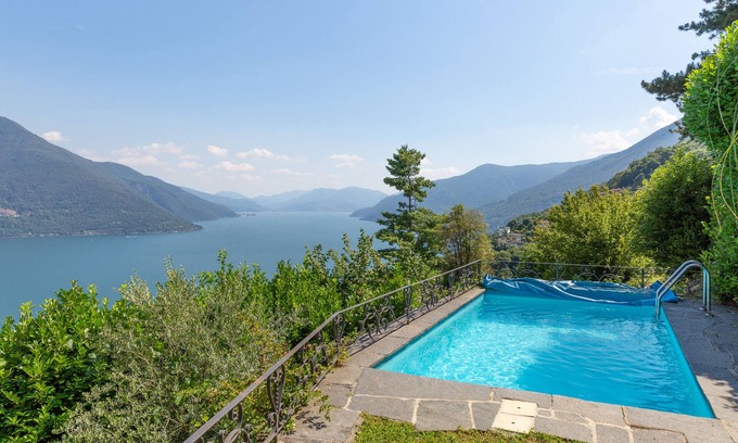 Brissago House | Holiday paradise with spectacular panoramic, Indoor - Outdoor Fireplace, Outdoor Swimming Pool