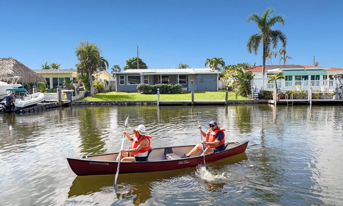 Melaleuca Gardens House | Home on Canal Unit B by PMI