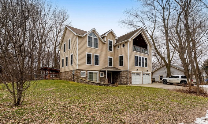 Malletts Bay House | Home on Lake Champlain with pool, hot tub, in-home gym, firepit, & lovely views