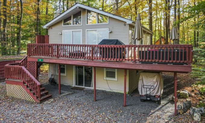 Thornhurst House | Home with a fireplace, gym, tennis, pool, beach access, game room & washer/dryer