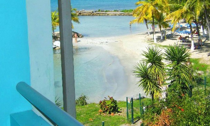 Pointe de la verdure Apartment | Homerez - 30 m away from the beach! Studio for 4 ppl. with sea view at Le Gosier