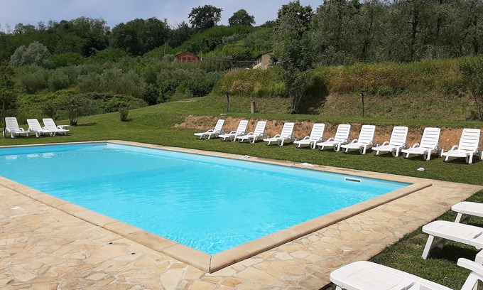 Montecarlo Apartment | Homerez - Big appartement for 11 ppl. with shared pool and garden at Montecarlo