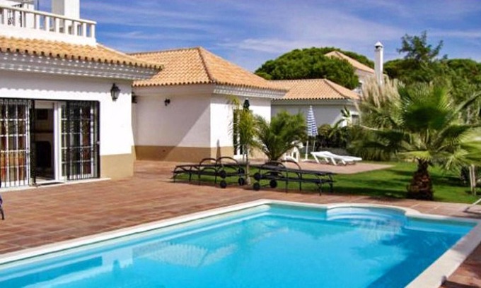 Nuevo Portil House | Homerez - House 500 m away from the beach for 4 ppl. with shared pool and garden