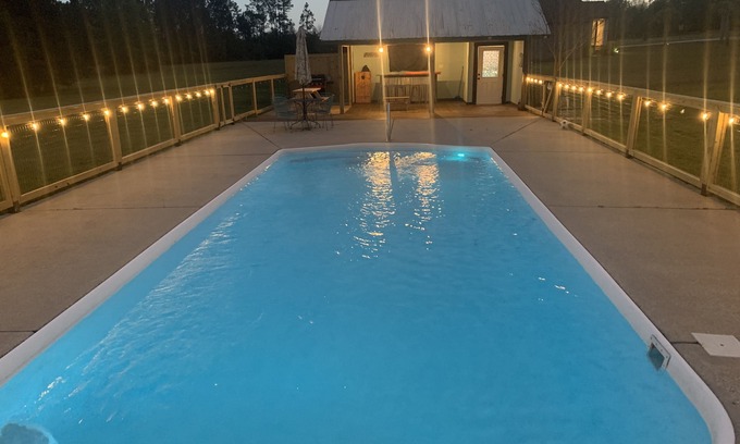 Gulfport House | Hometown Hideway: Family friendly with private pool and pond.
