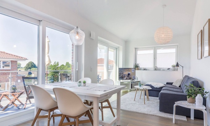 Wangerland Apartment | Hookser Perle: Modern hygge penthouse directly behind the dyke