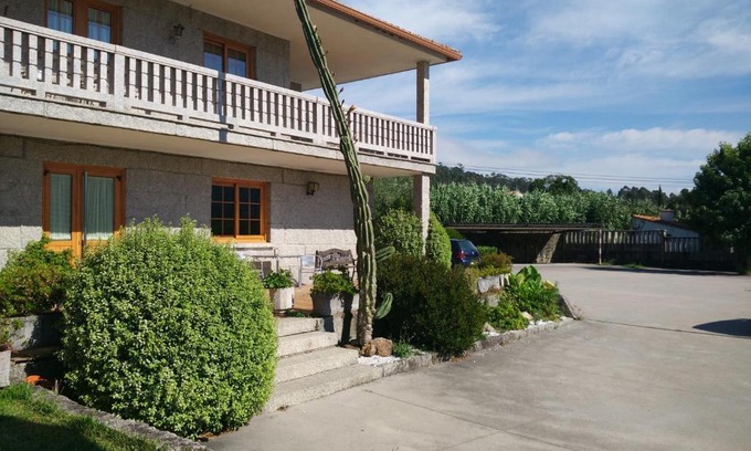 Tomino House | Hostal - Restaurante Casa Cuña