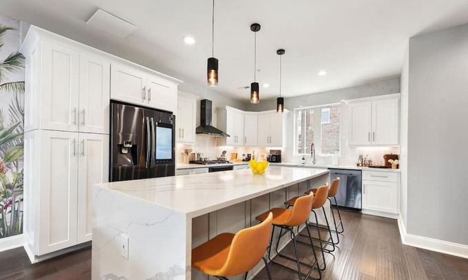 Lower Lawrenceville House | HostWise Stays - The Charlotte - Rooftop patio, Garage Parking, Prime Location, Large 3 Story Home