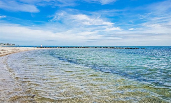 Falmouth Condo | Hot tub on your deck and beach across the street.Relax