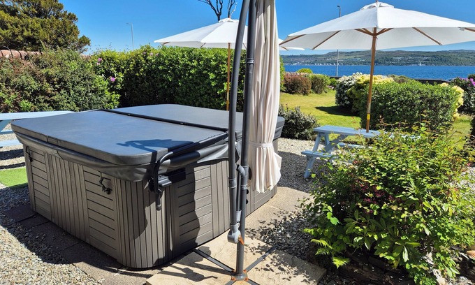 Kilmun House | Hot tub. Water views. Sleeps 12. A perfect base to explore Argyll. Pet friendly.