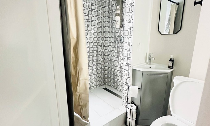 Guelph House | Hotel style private main level if townhome