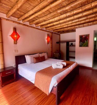 Zetaquira Hotel | Hotel y termales Las Heliconias