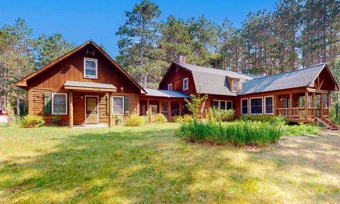 Mauston House | Huge dog-friendly cabin with large outdoor spaces, 2 kitchens, & game room