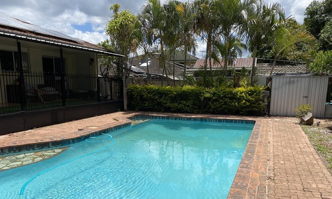 Sunnybank House | Huge home with cool pool in Sunnybank just for you