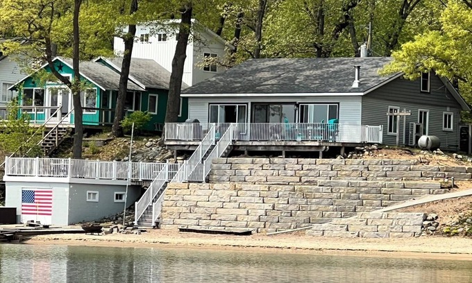 Baldwin Cottage | Huge sandy beach with amazing lake view directly on Big Star Lake!