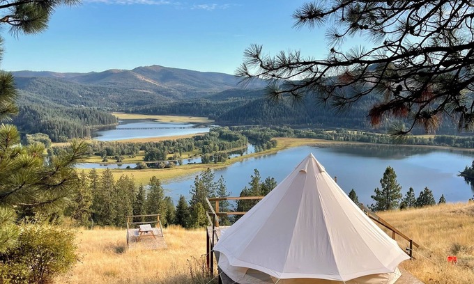 Harrison Cabin | Idaho Getaways Beautiful Glamp tent with lakeview of Lake Coeurdalene & campfire
