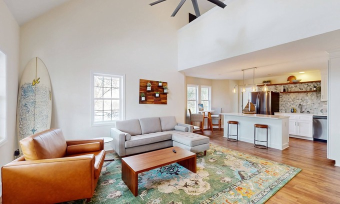 Hampstead House | Idyllic retreat with surfboards, hot tub, open layout, & firepit - dog-friendly