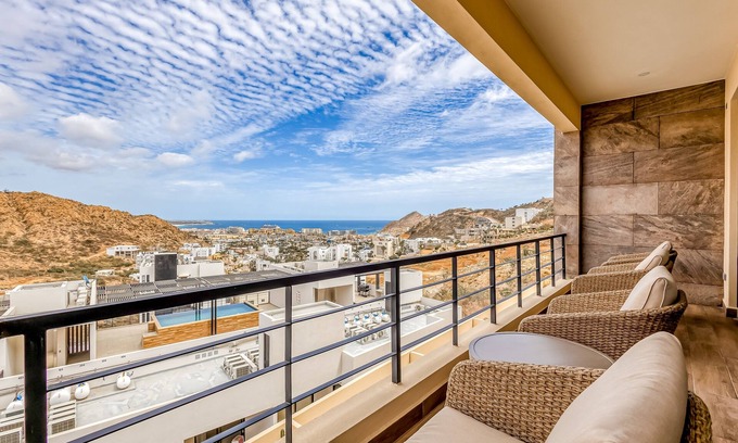 Libertad Apartment | Immaculate stay with stunning views, balcony, plus on-site pool & gym