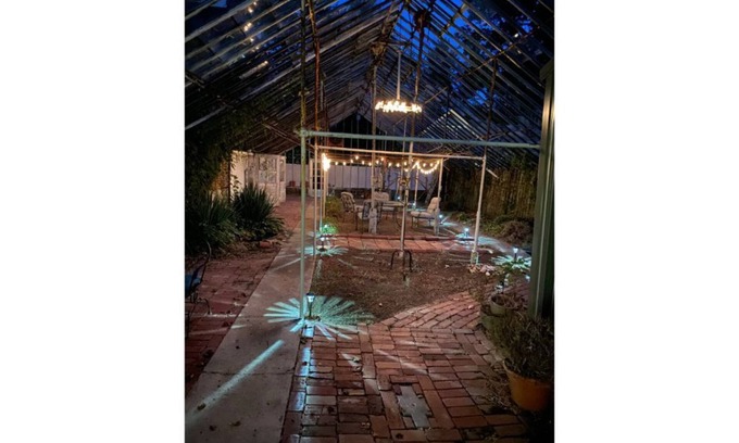 Sedalia Villa | Immaculately Remodeled Historic building and Greenhouse with fire pit