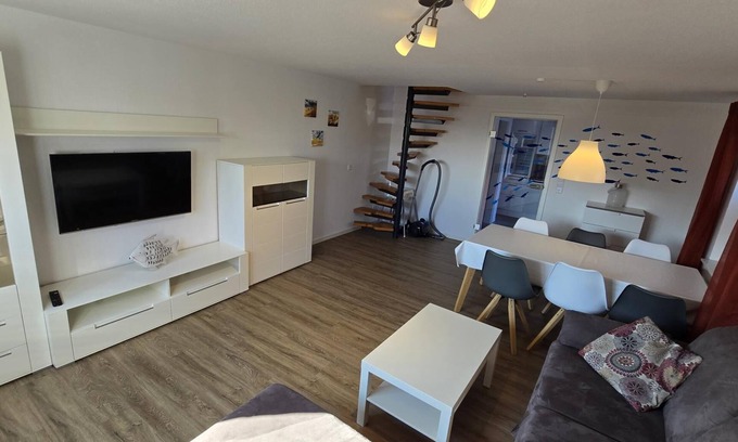 Dornumergrode Apartment | In a quiet residential area + fenced garden + free WiFi + by the sea + dogs welcome + modern furnishings