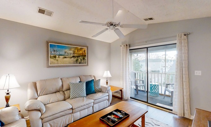 Little River Condo | Inviting condo with pool, hot tub, tennis, balcony, & washer/dryer