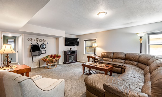 Northwest Colorado Springs House | Inviting home with mountain view, fireplace, kitchenette, & central AC