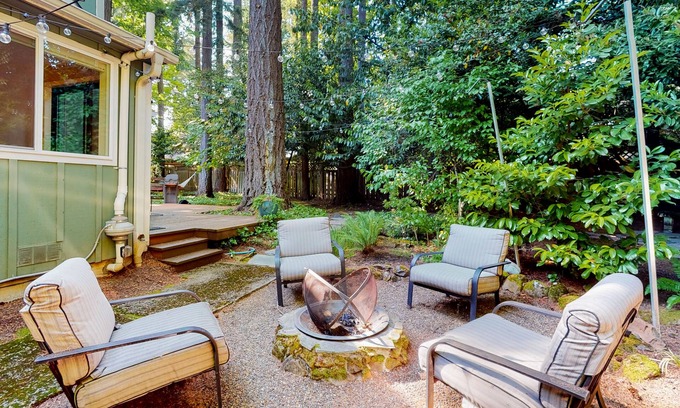 Lake Grove House | Inviting home with enclosed yard, firepit, hot tub, hammock, washer/dryer