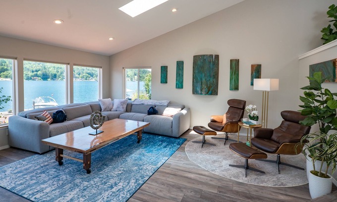 Big Lake House | Inviting lakefront home with hot tub, game room, dock, kayaks, pool table, & W/D