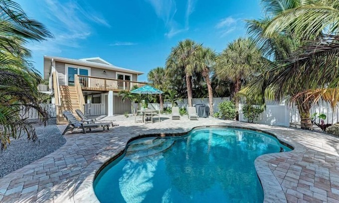 Anna Maria House | Island in the Sun, luxury beach house with private pool, walk to Pine Ave