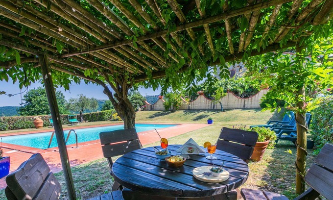 Castelnuovo di Val di Cecina Apartment | Nice apartment for 4 people with A/C, pool, WIFI, TV, patio, pets allowed and parking