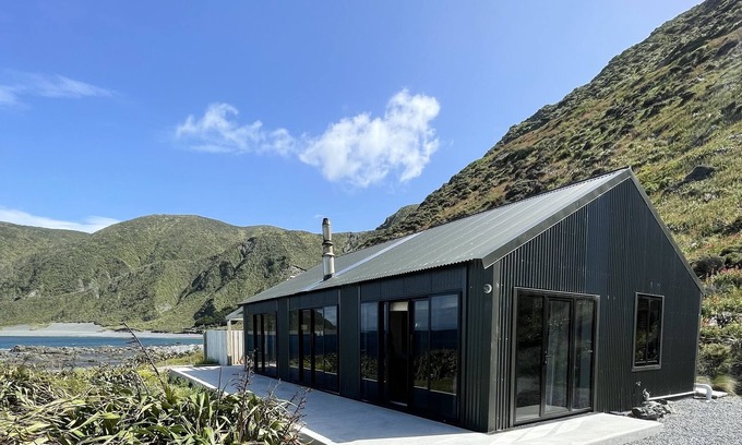 Wellington House | Juliet’s beachfront bach on Wellington’s wild south coast