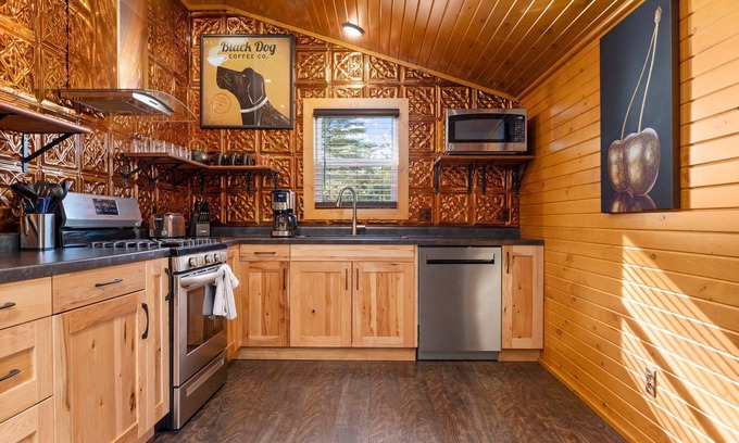 Interlochen House | Just outside Traverse City Hot Tub King Bed Fire Place Full Kitchen PET Friendly